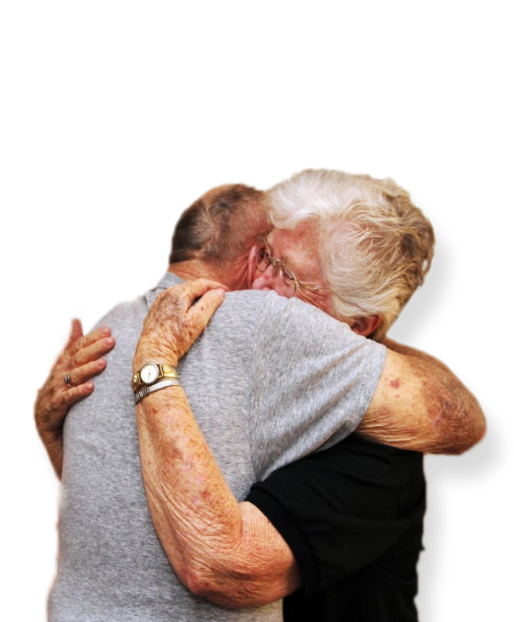 An older woman embraces a man, her arms wrapped around his shoulders.